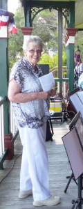 Trish Ryan directing music at the 2015 Mass